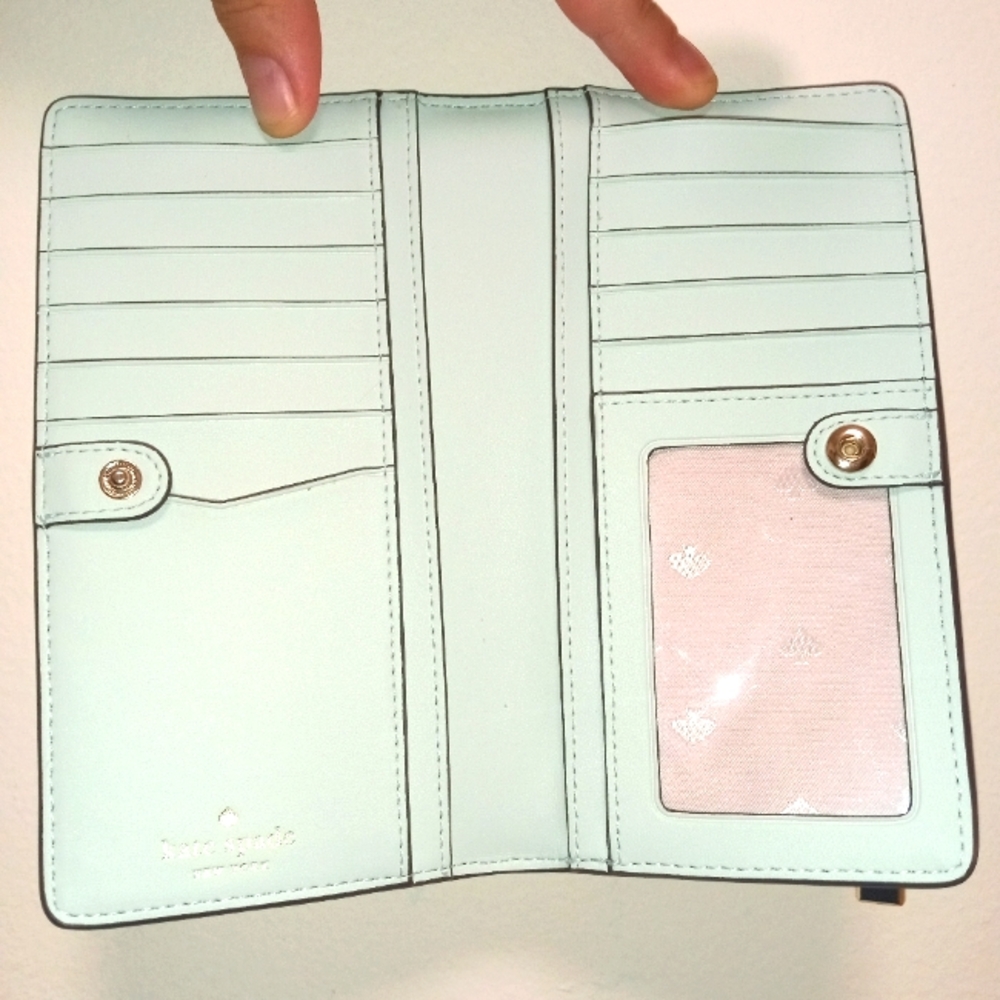 Kate Spade "Darcy" large slim bifold wallet